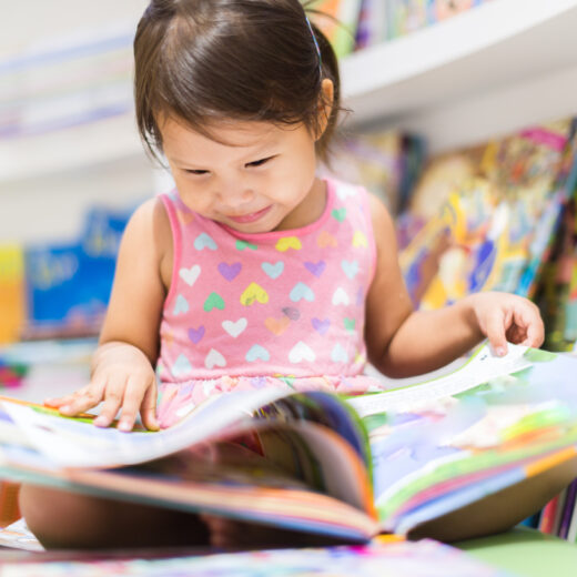 Little girl reading.