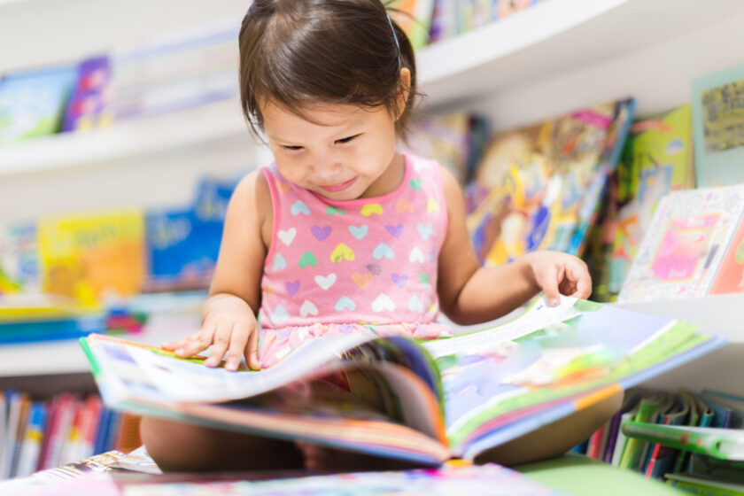 Little girl reading.